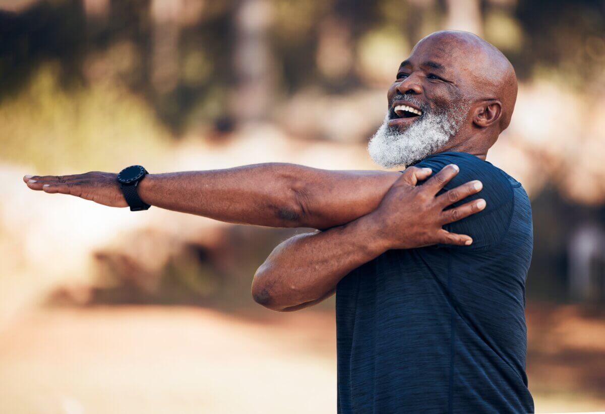 A big old man exercising and stretching